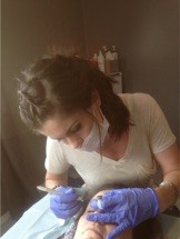 Kim Wayman Performing Microblading